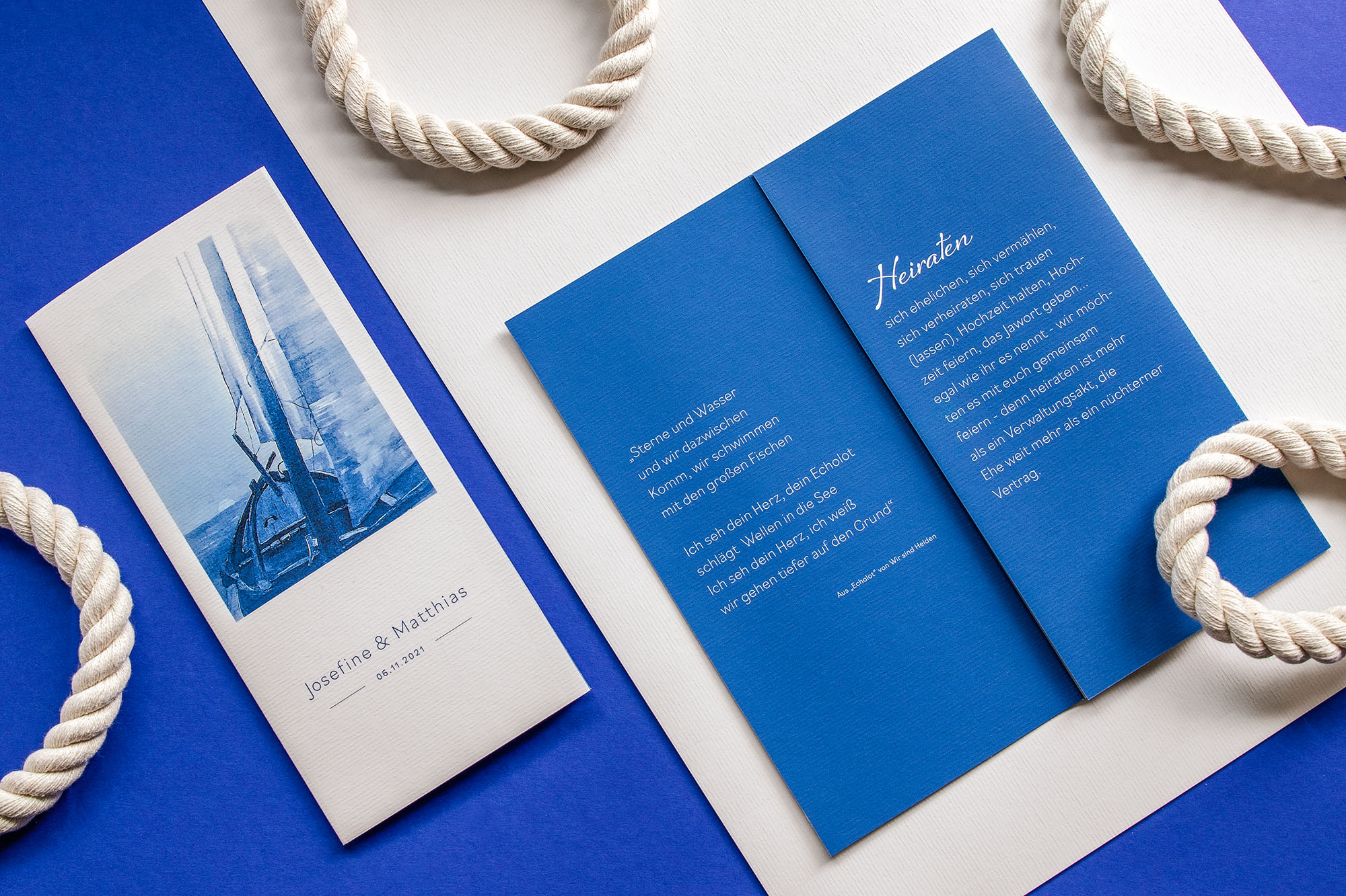 Hochzeitseinladung in Blau und Weiß